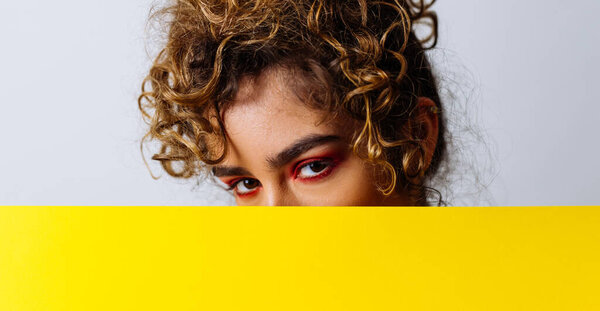 Beautiful girl posing in studio for a "body positivity" photo session