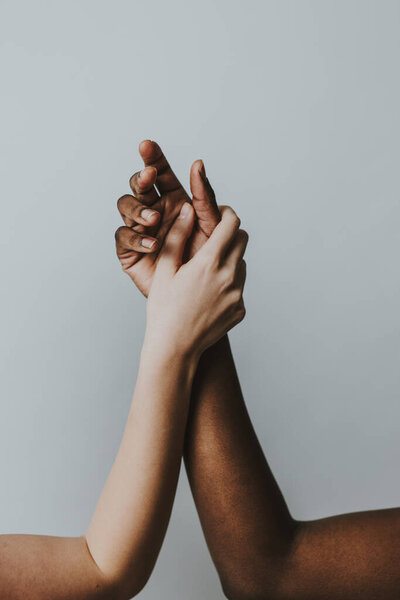 Two girls from different ethnicities posing in studio for a "body positivity" photo session