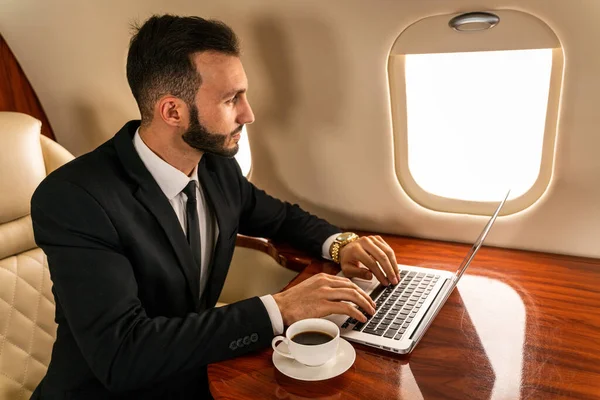 Handsome Businessman Wearing Elegant Suit Flying Exclusive Private Jet Successful — Stock Photo, Image