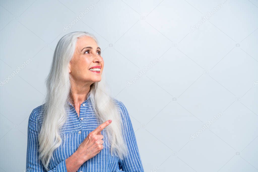 Beautiful senior woman portrait, studio shot on background  - Elderly person, half body shot