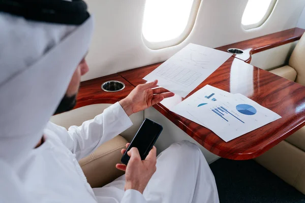 Business man from united arab emirates flying on his private jet to Dubai