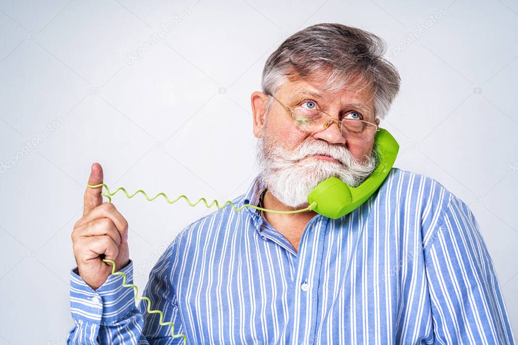 Eccentric senior man with funny expression portrait on background - Active and youthful old male