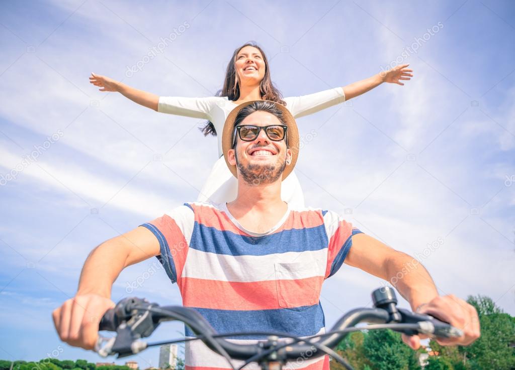 Happy couple on the bicycle