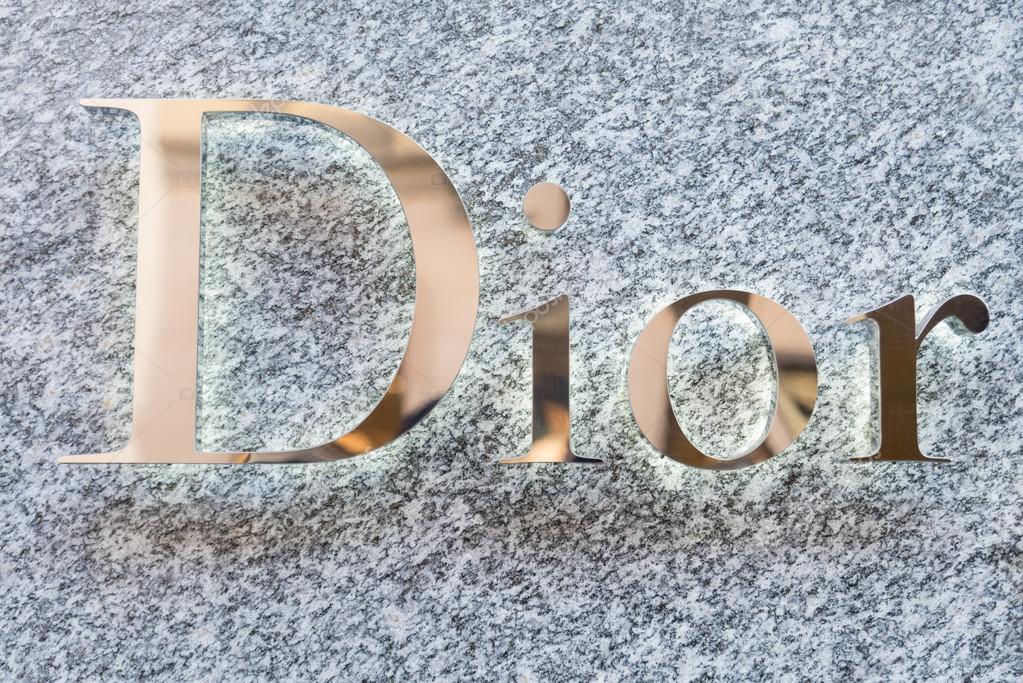 MILAN,ITALY - DECEMBER 30, 2014: Dior logo on a boutique shop.Dior is a world famous fashion brand.
