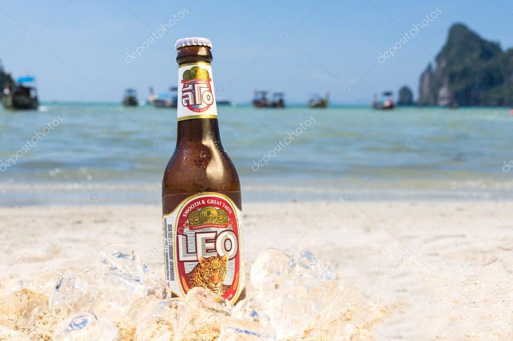 PHI PHI ISLAND,THAILAND - FEBRUARY 27,2015: Leo beer on the beach.Leo beer created by boon rawd brewery co.,ltd in Thailand