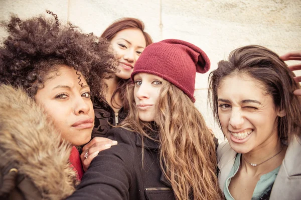 Four young beautiful girls smiling — Stock Photo, Image