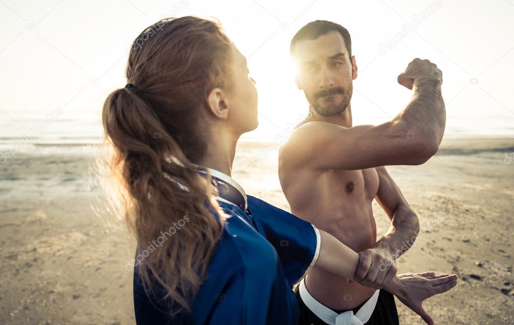 martial art training on the beach