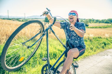 Senior man on bike