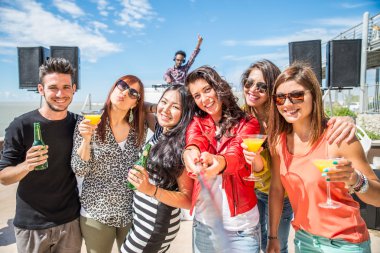Friends taking selfie at party