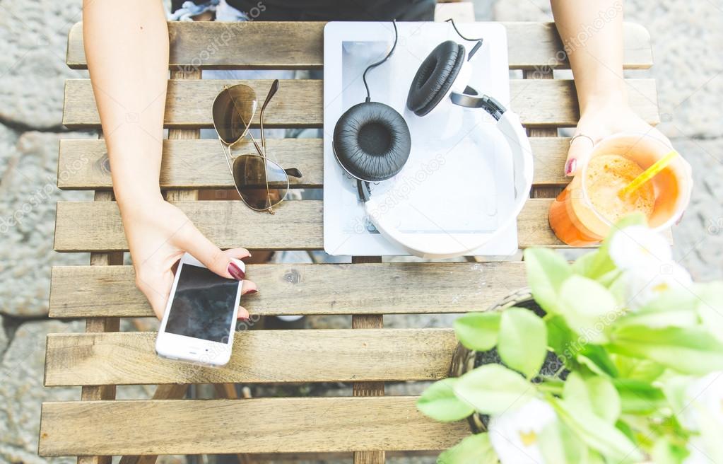 tablet,headset and woman hand