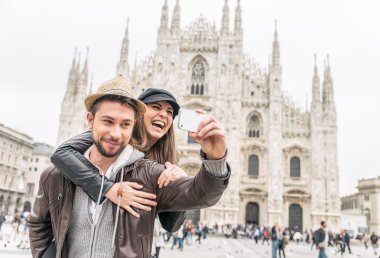 Tourists at Duomo cathedral,Milan clipart