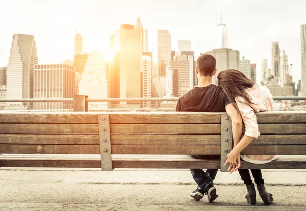 Couple relaxing on New york bench Royalty Free Stock Photos