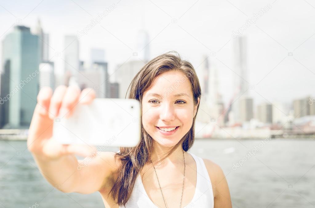 Beautiful girl taking selfie