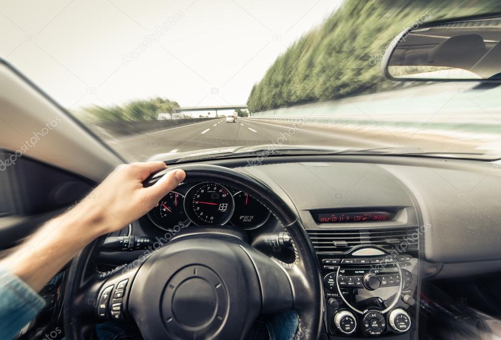 Driving fast with a sport car