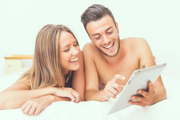 Happy couple waking up in love — Stock Photo, Image