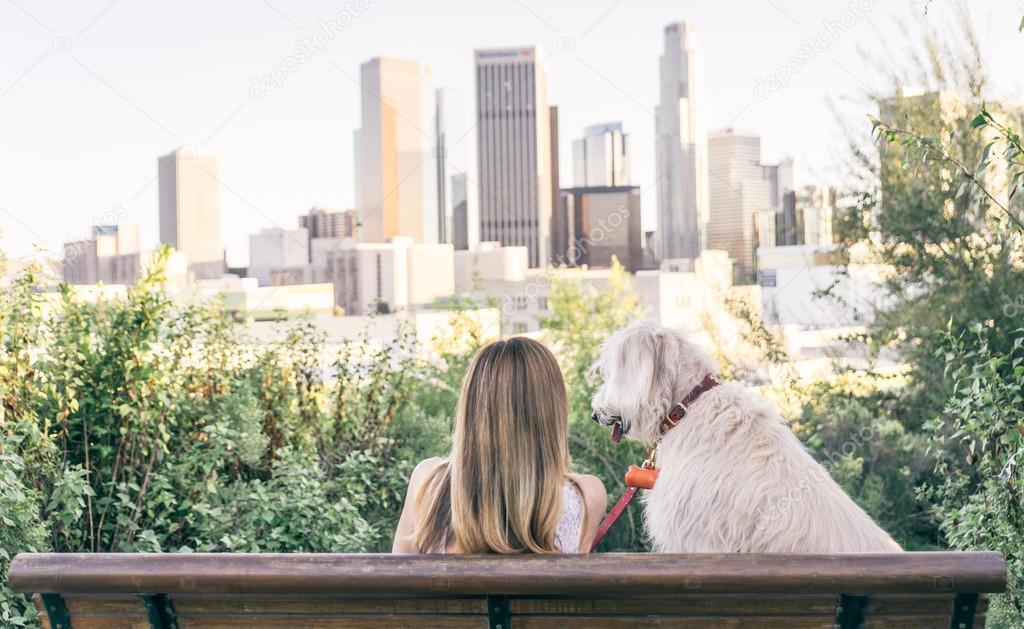 Woman sitting with her dog