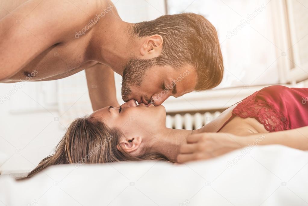 beautiful couple on a bed