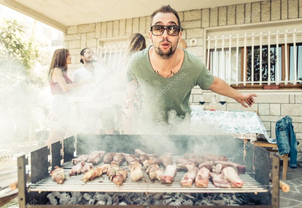 Group of friends making barbecue