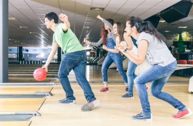 Group of friends playing bowling clipart