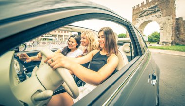 Three girls driving around in the city and listening to music  clipart