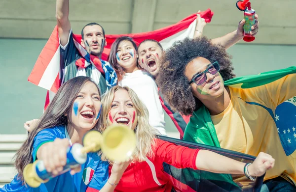 Group of fans supporting their team at the arena — Stock Photo, Image