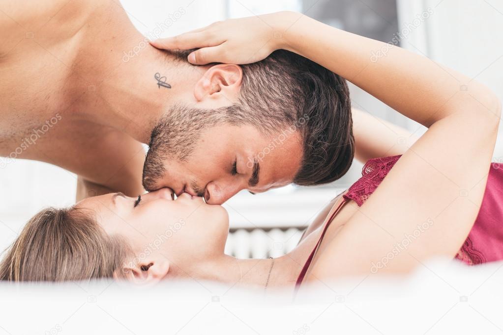 beautiful couple on a bed