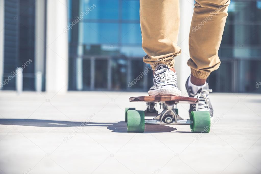 Skateboarder riding on his board