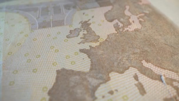 Τραπεζικό χαρτονόμισμα σε μακροεντολή. Χάρτης της Ευρώπης στο νομοσχέδιο. Σημάδια νερού. Μετρητά. Ισχυρό νόμισμα. — Αρχείο Βίντεο