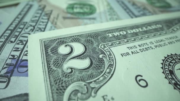 Neue Art von amerikanischem Dollargeld. Rückseite der Banknoten in US-Währung. Symbole für die Detailansicht auf Hundert-Dollar-Banknoten. Dollar Makroschießen, Geld sparen Konzept — Stockvideo