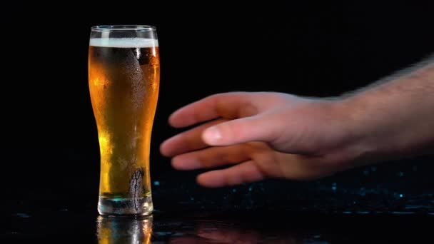 Celebration beer cheers concept - close up hand takes the glass of beer in outdoor party during their victory competition or successful task meeting vacation — Stock Video