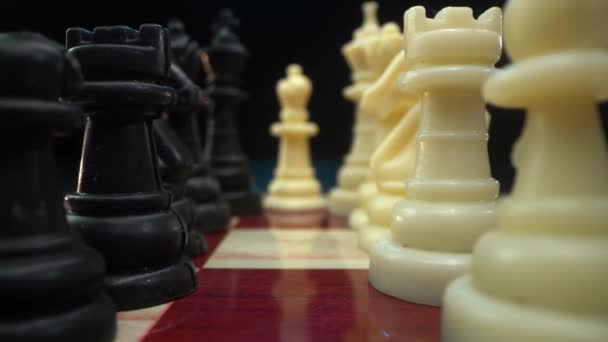 Chess figures on chess board makro shot 4k — Stockvideo