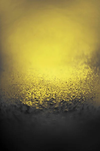 黄色灰色の抽象的な背景と小さなボケの焦点を当てたライト — ストック写真