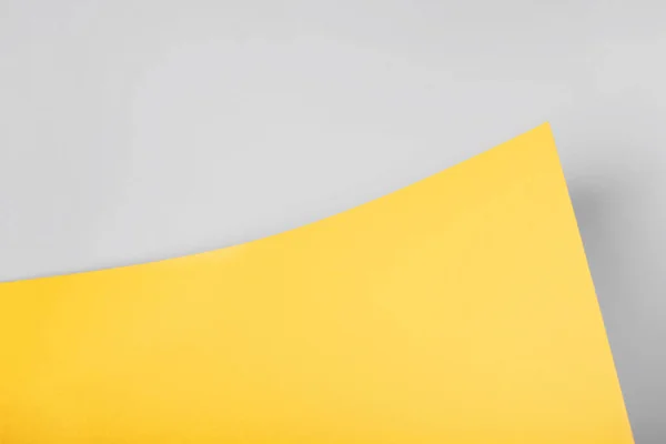 Fond en papier abstrait jaune et gris d'une feuille incurvée. Blank pour site web, publicité, présentation — Photo
