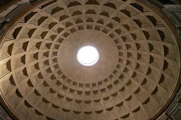 The roof of the Pantheon in rome with the light coming through the "Oculus" ("eye hole in latin")