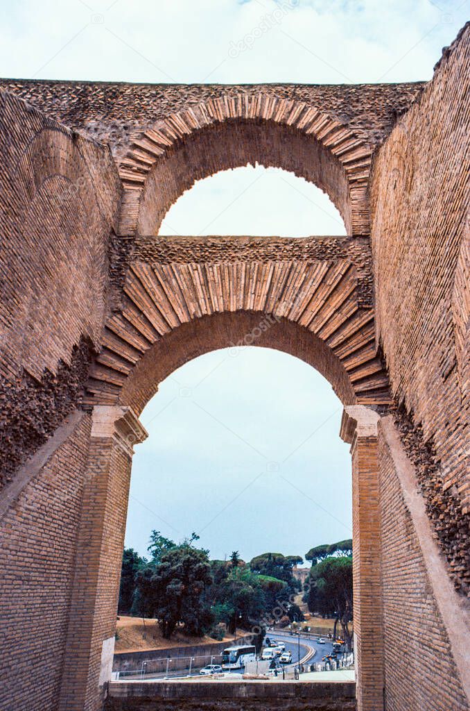 Details of the Colosseum amphitheatre in Rome during the day, shot with analogue film technique