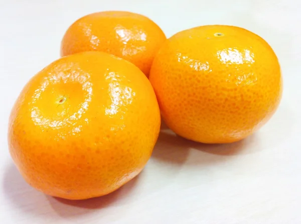 Three oranges on isolated white background — Stock Photo, Image