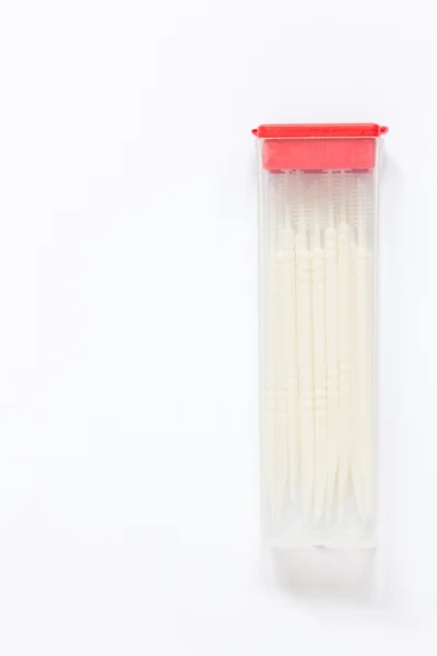 Dispositivo oral: palillo de dientes sobre fondo de papel blanco —  Fotos de Stock