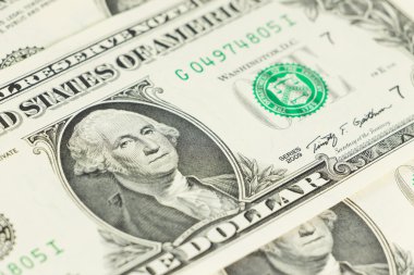 Arka plan üzerinde bir dolar Close-Up