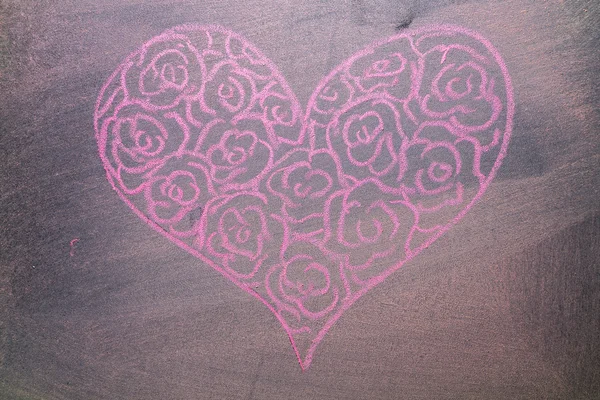 Hand drawn pink hearts on chalkboard background. — Stock Photo, Image