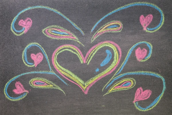 Hand drawn hearts shape on chalkboard background. — Stock Photo, Image