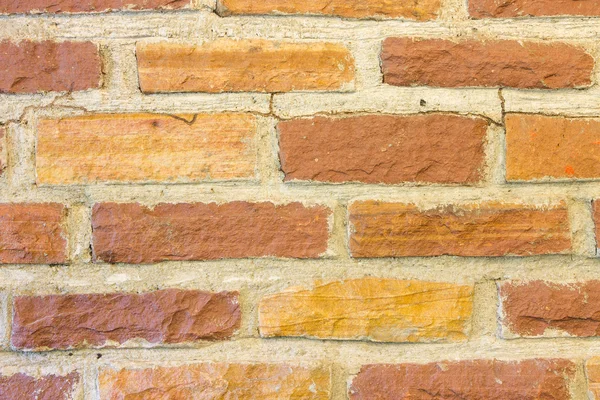 Vecchio muro di mattoni giallo e marrone Sfondo — Foto Stock
