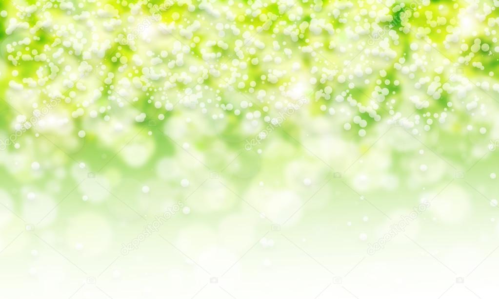 Green and yellow glitter sparkle on white background