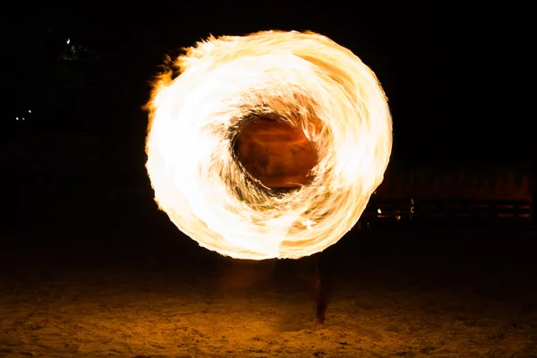 Man Fire Show on the beach — Stock Photo, Image