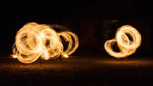 Man Fire Show on the beach — Stock Photo, Image