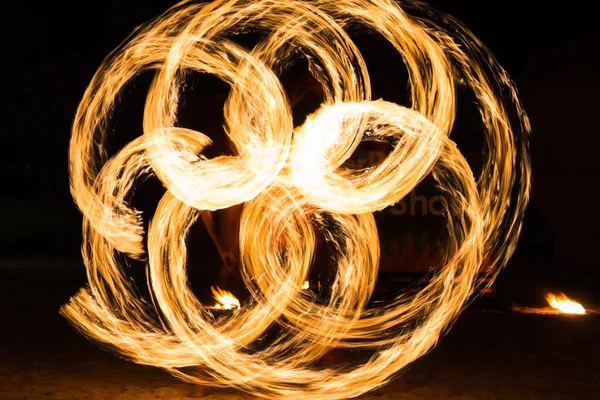 Man Fire Show on the beach — Stock Photo, Image