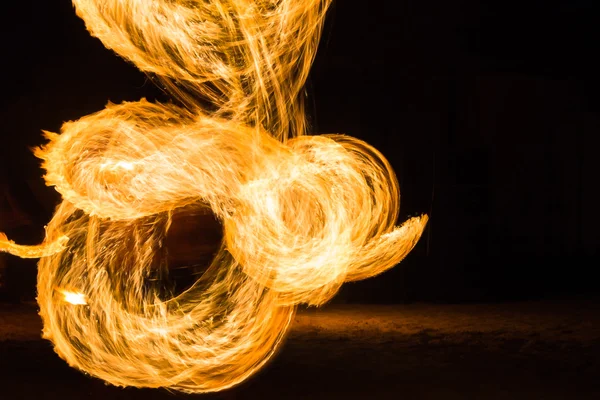 Man Fire Show on the beach — Stock Photo, Image