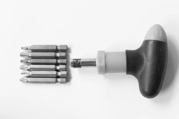 Set of steel screwdrivers on a white paper background — Stok fotoğraf