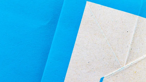 Papel en blanco, bloc de notas de papel azul sobre fondo azul —  Fotos de Stock