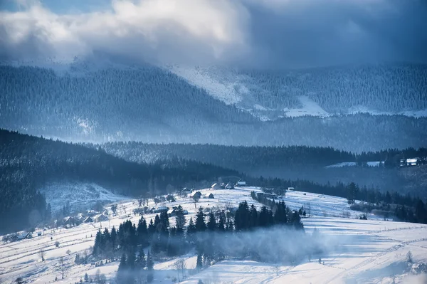 top view of a mountain village. natural winter background. toned