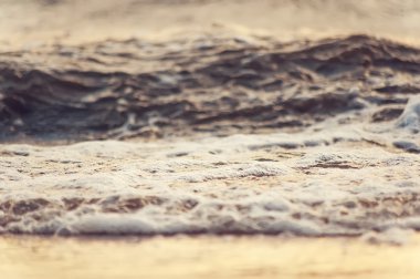 dalga okyanus sunset bulvarında sıçramasına. doğal vintage yaz arka plan